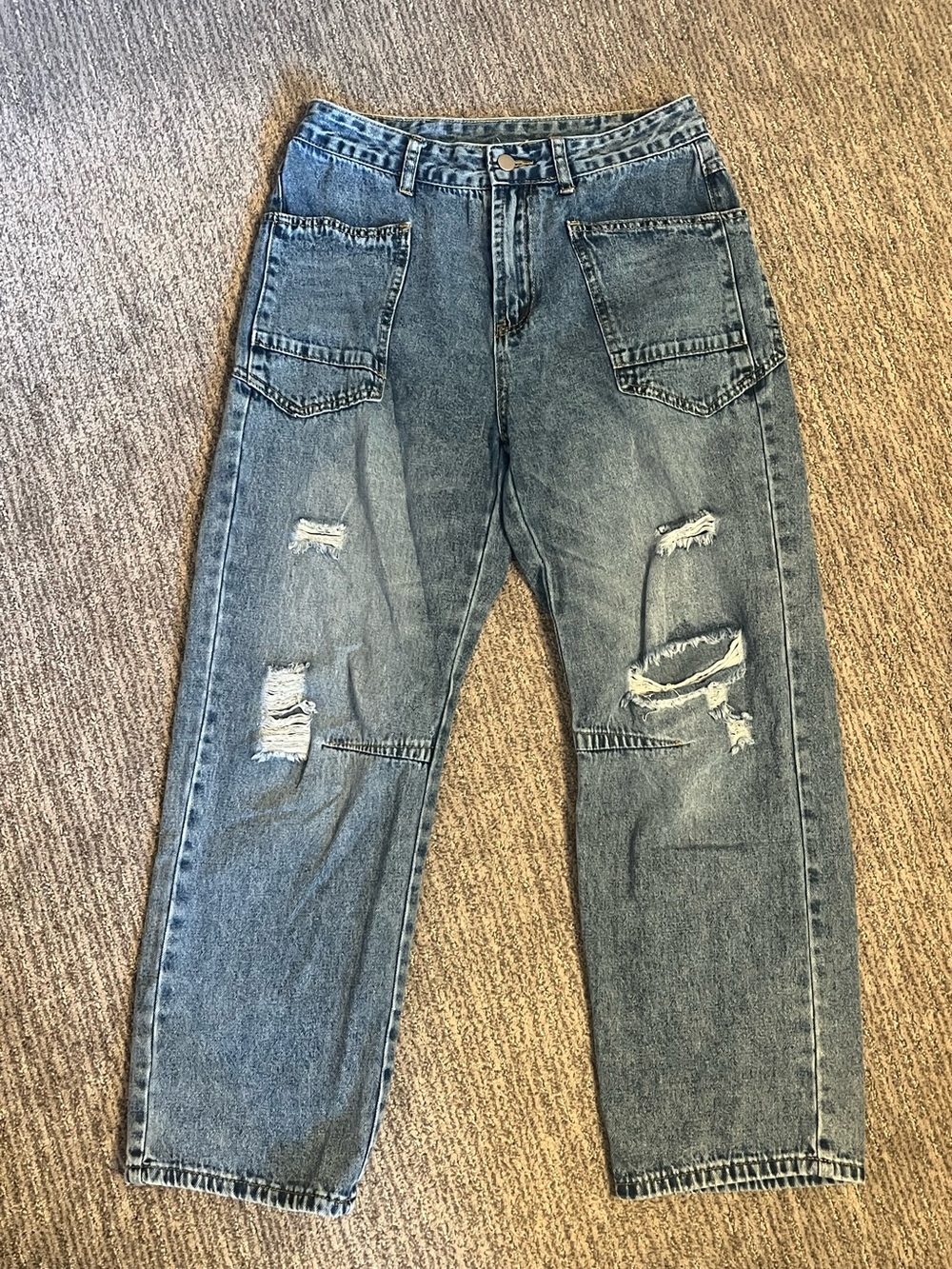 Barrel-leg, distressed jeans